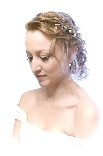 Novia en un vestido de novia en un blanco —  Fotos de Stock