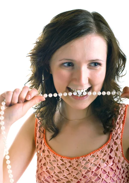Chica sostiene una perla perlas —  Fotos de Stock