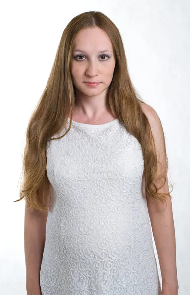 Schwangere in weißem Kleid — Stockfoto
