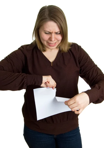 Vrouwen breekt een papier — Stockfoto