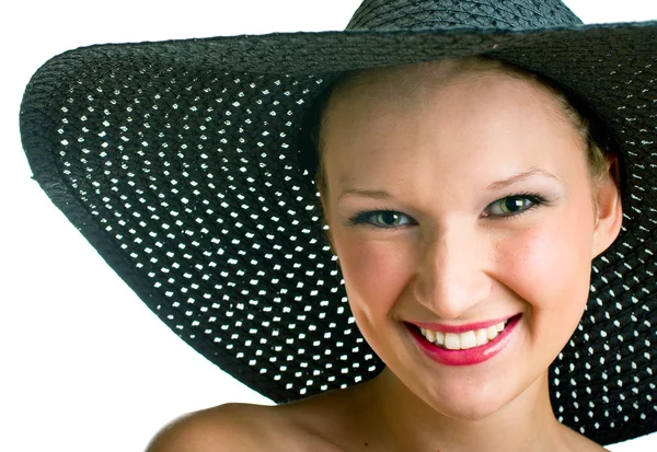 Smiling women in black hat — Stock Photo, Image