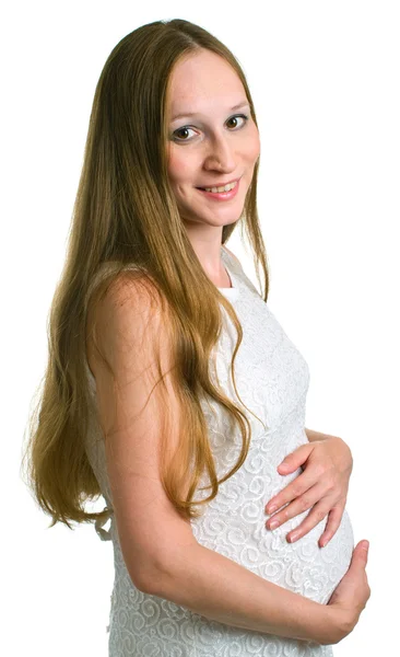 Schwangere in weißem Kleid — Stockfoto