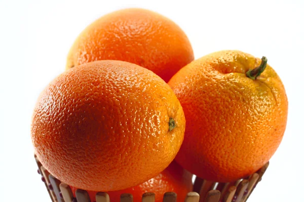 Oranges in basket — Stock Photo, Image