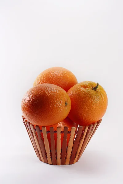 Oranges in basket — Stock Photo, Image