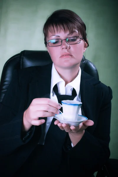 Business woman with cup of tea — Stock Photo, Image