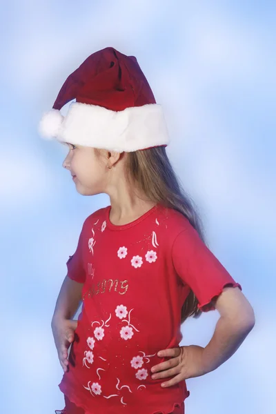 Dziewczyna w czerwonym santa — Zdjęcie stockowe