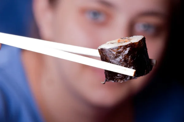 stock image Human take sushi by chopsticks