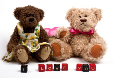 Couple teddy bears with heart. clipart