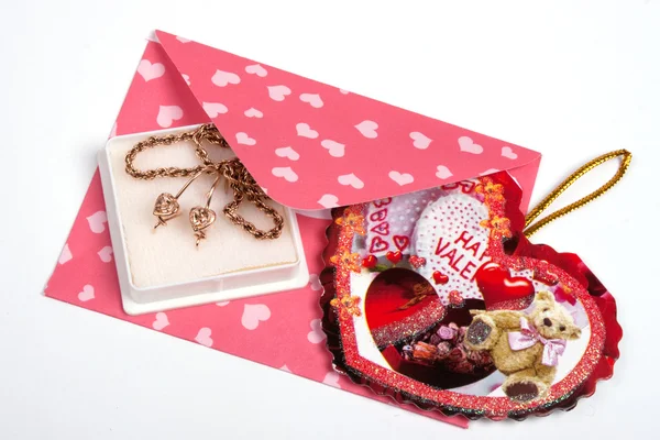 Rosa paket med present till alla hjärtans Stockfoto