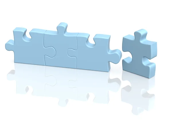 Four parts of a puzzle — Stock Photo, Image