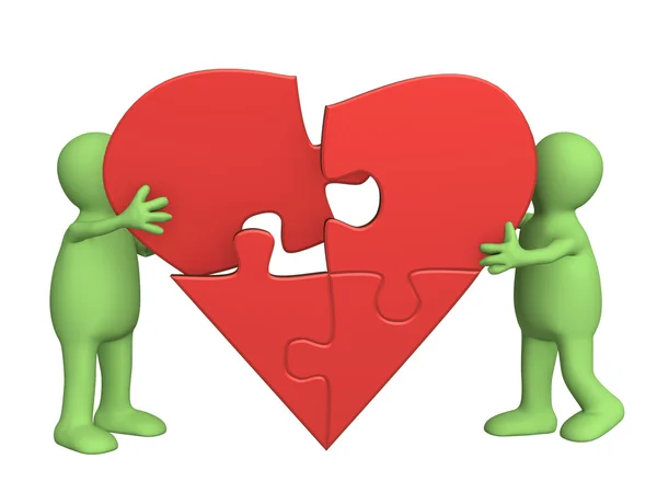 Heart from parts of a puzzle — Stock Photo, Image