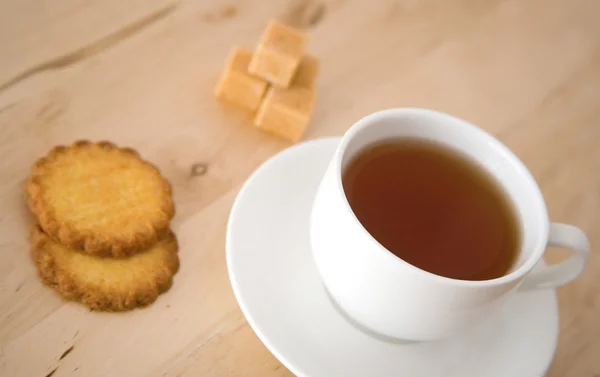 Xícara de chá ou café, açúcar e biscoitos — Fotografia de Stock