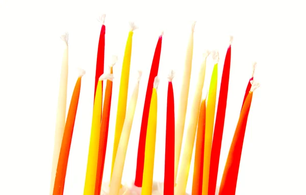 Muchas velas de cumpleaños sobre blanco —  Fotos de Stock