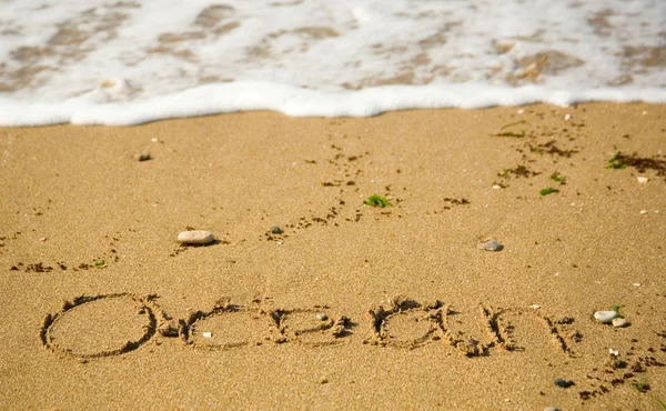 在沙滩上写的字海洋 — 图库照片
