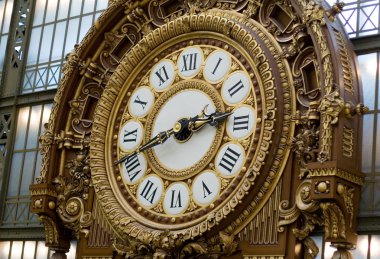 Closeup of the clock in the Orsay museum clipart