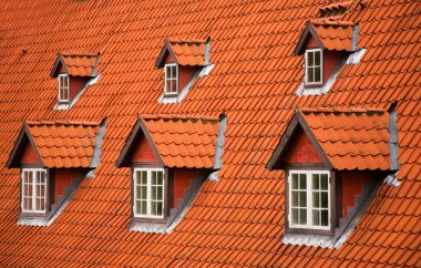 Red tile roof and garrets clipart