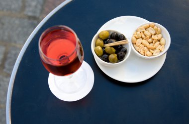 Kir cassis and nibbles clipart