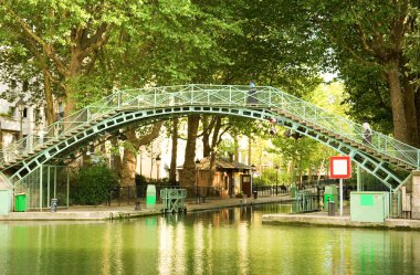 Pedestrian bridge on Saint-Martin canal clipart