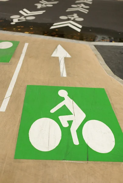 Bicycle road signs painted on asphalt — Stock Photo, Image