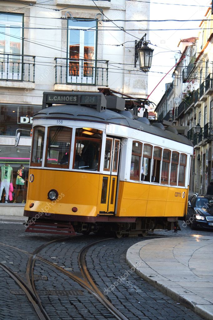 Old fashioned yellow tram in Lisbon