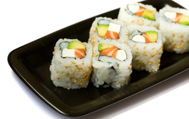 Six california rolls on a plate clipart