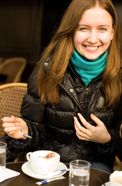 Beautiful smiling girl with cappuccino — Stock Photo, Image