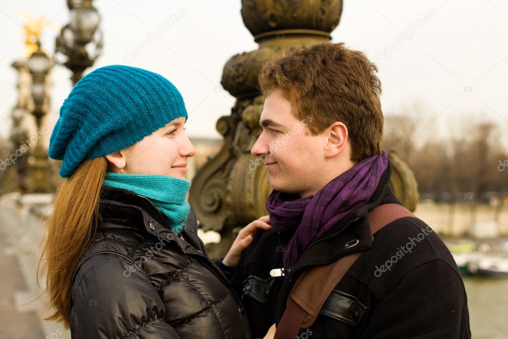 Romantic loving couple in Paris, looking in each