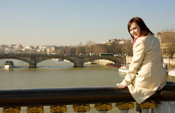 Happy beautiful girl in Paris sitting on the bal — Stock Photo, Image