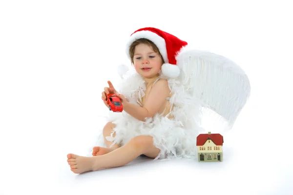 Little angel with car and house — Stock fotografie