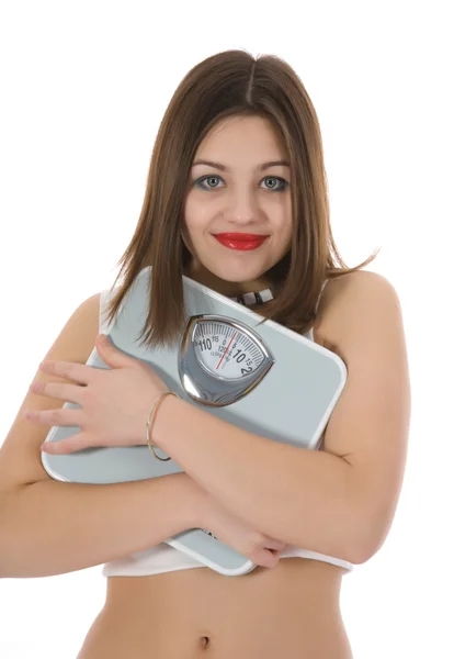 Красивая девушка с весами — стоковое фото