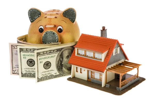 Miniature house with dollars isolated — Stock Photo, Image