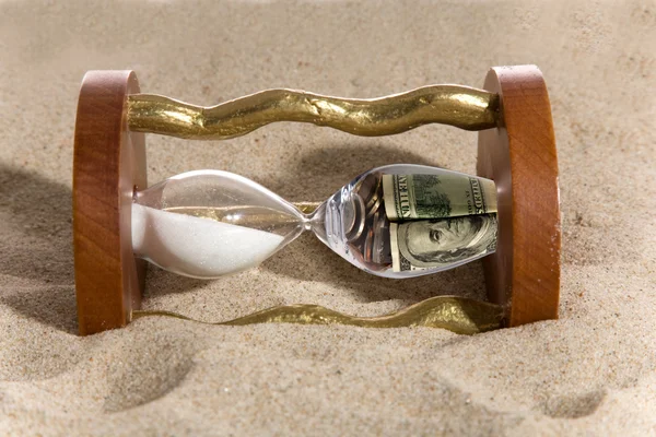 Hourglass and financial crisis — Stock Photo, Image