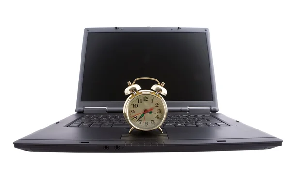 노트북 및 알람 시계 — 스톡 사진