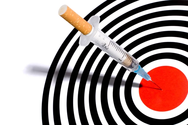 Cigarette syringe in target — Stock Photo, Image