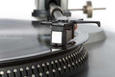 Stylish turntable with vinyl record clipart