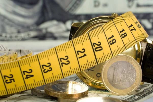 Coins with metre — Stock Photo, Image