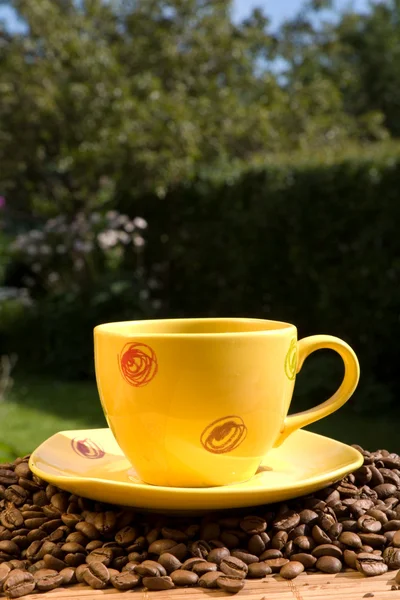 Gele koffiekop — Stockfoto