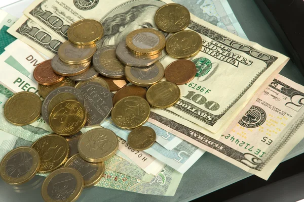 Peníze koláž s bankovkami a mincemi — Stock fotografie