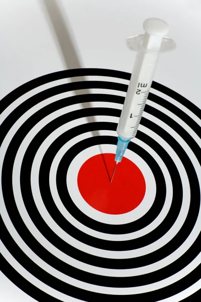 Syringe in a Dartboard — Stock Photo, Image