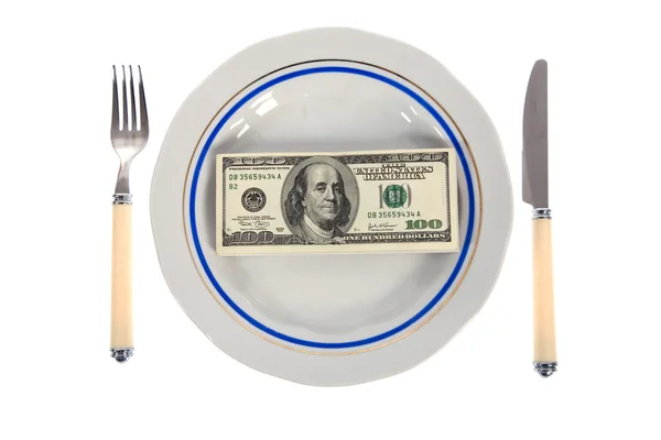 Dólares em prato de comida — Fotografia de Stock
