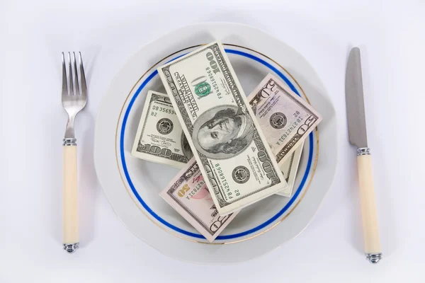Dollari sul piatto di cibo — Foto Stock