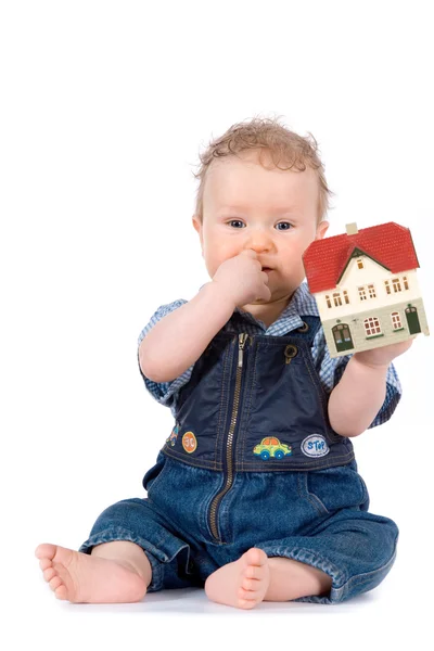 stock image Baby with house model