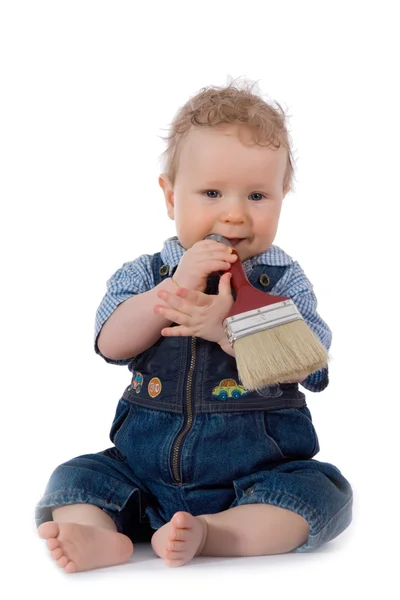 Младенец с кисточкой — стоковое фото