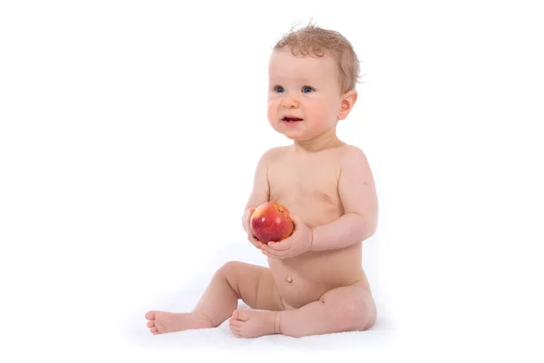 Baby med äpple — Stockfoto