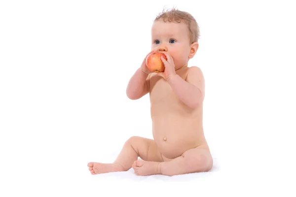 Baby with apple — Stok fotoğraf