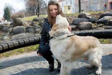 The young girl and dog