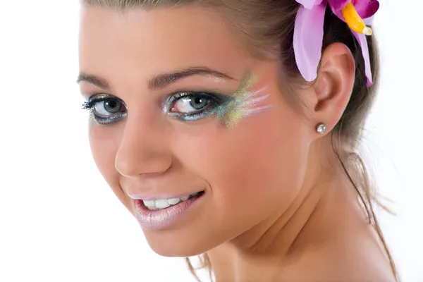 Dívka s tváří art butterfly barvy — Stock fotografie