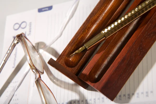 Glasögon, penna, anteckningsblock — Stockfoto