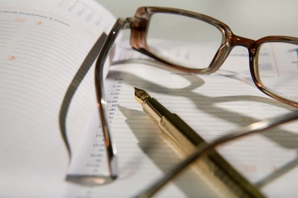 Glasses, pen, notebook — Stock Photo, Image