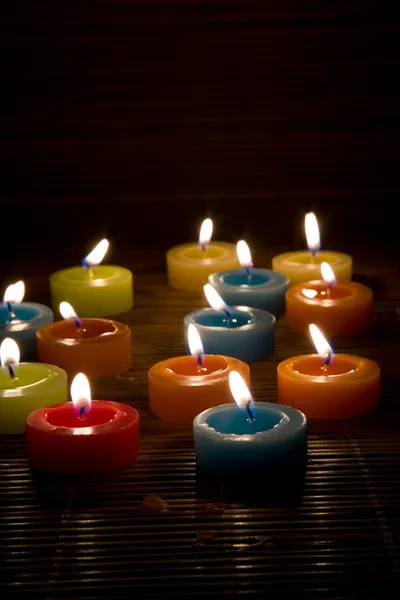 Many candles on background — Stock Photo, Image